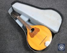 A Japanese Ozark mandolin in case