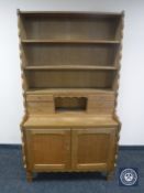 A continental oak secretaire bookcase