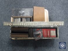 A tray of four boxes of antique glass slides