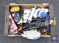 A box of Star Wars figures, toys,