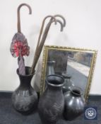 A metal and marble standard lamp, three pottery vases,