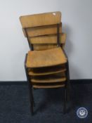 Four mid 20th century school chairs