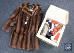 A lady's vintage fur coat together with a box of hats, leather hand bags,