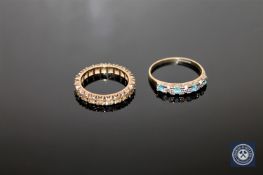 A 9ct gold synthetic spinel eternity ring and an aquamarine half-eternity ring CONDITION