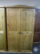 A pine double door wardrobe