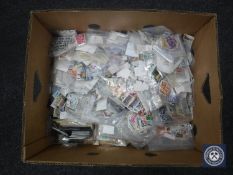 A box of loose stamps