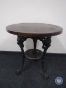 A cast iron Britannia bar table