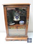 A Victorian oak glazed door fitted smoker's cabinet