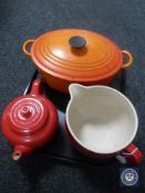 A cast iron Le Crueset pot with lid,