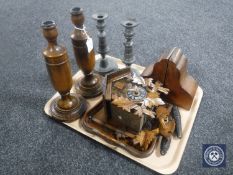 A tray of wooden candlesticks, pewter bookends, crumb tray,