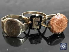 A gent's 9ct gold signet ring (a/f) together with two other yellow metal rings CONDITION