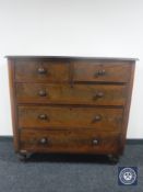 A Victorian mahogany five drawer chest