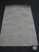A hand tufted self embossed grey rug, 120 cm x 180 cm, rrp £297.