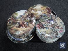 A tray of assorted collector's plates with certificates
