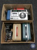 Two boxes of vintage projectors