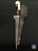 An Eastern dagger with bone hilt,