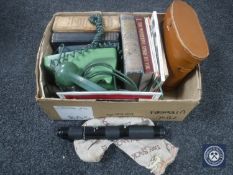 A box of retro telephone, binoculars, antiquarian and later volumes,