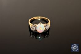An 18ct gold opal and diamond three-stone ring,