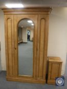 A Victorian ash mirror door wardrobe and pot cupboard CONDITION REPORT: Wardrobe is