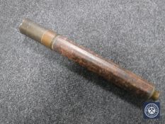 An early 20th century brass and leather cased telescope