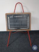 A mid 20th century child's Triang chalkboard on metal stand