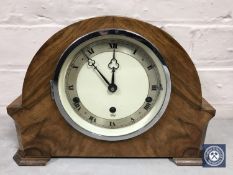 A walnut cased Elliott mantel clock with pendulum and key