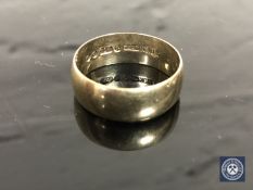 A 9ct gold band ring, size V/W CONDITION REPORT: 6.