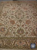 A floral Axminster fringed carpet