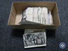A box of black and white photographs - African wildlife and France