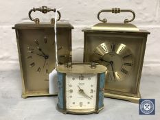 Three Swiza brass desk clocks