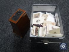 A Victorian stereoscopic slide viewer with glass slides and a Carte De Visite portraits