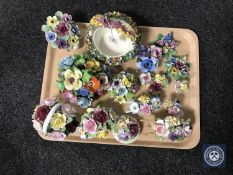 A tray of china flower posies and a china flower encrusted basket