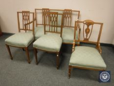 An Edwardian four piece salon suite comprising of two seater settee,
