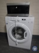 A Hotpoint Aquarius slim line washer together with a microwave