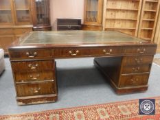 A Victorian mahogany twin pedestal partner's desk CONDITION REPORT: 76cm high by