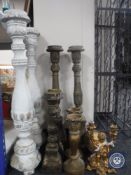 Four sets of wooden candlesticks,