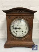 An oak cased bracket clock retailed by Morath Brothers of Liverpool,