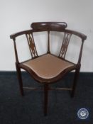 A Victorian inlaid mahogany corner chair