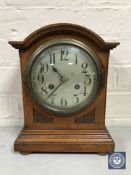 A mahogany cased bracket clock with silvered dial,