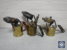 Three early 20th century brass blow lamps by Monitor and Bladon