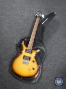 A Stag PRS set neck electric guitar in Ritter carry bag