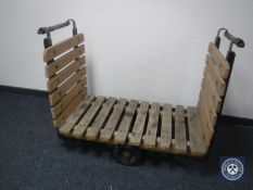 A mid 20th century Slingsby wooden bound luggage trolley