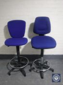 A pair of swivel adjustable typists high chairs