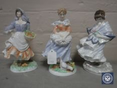 Two Royal Worcester Old Country Ways figures; Rosie Picking Apples and The Milkmaid,