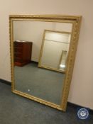 A contemporary gilt framed bevelled mirror 74 cm x 94 cm