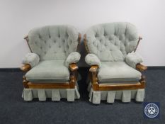 A pair of 20th century wooden framed armchairs in green button dralon