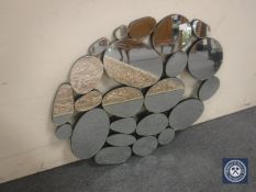 An all glass pebble mirror