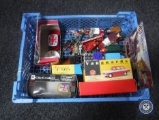 A crate of lead figures, boxed and unboxed die cast vehicles,