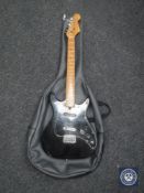 A Kay KL1 Stratocaster style guitar in carry bag
