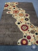 A hand knotted herbal wash chocolate brown rug, 180 cm 270 cm, rrp £1347.